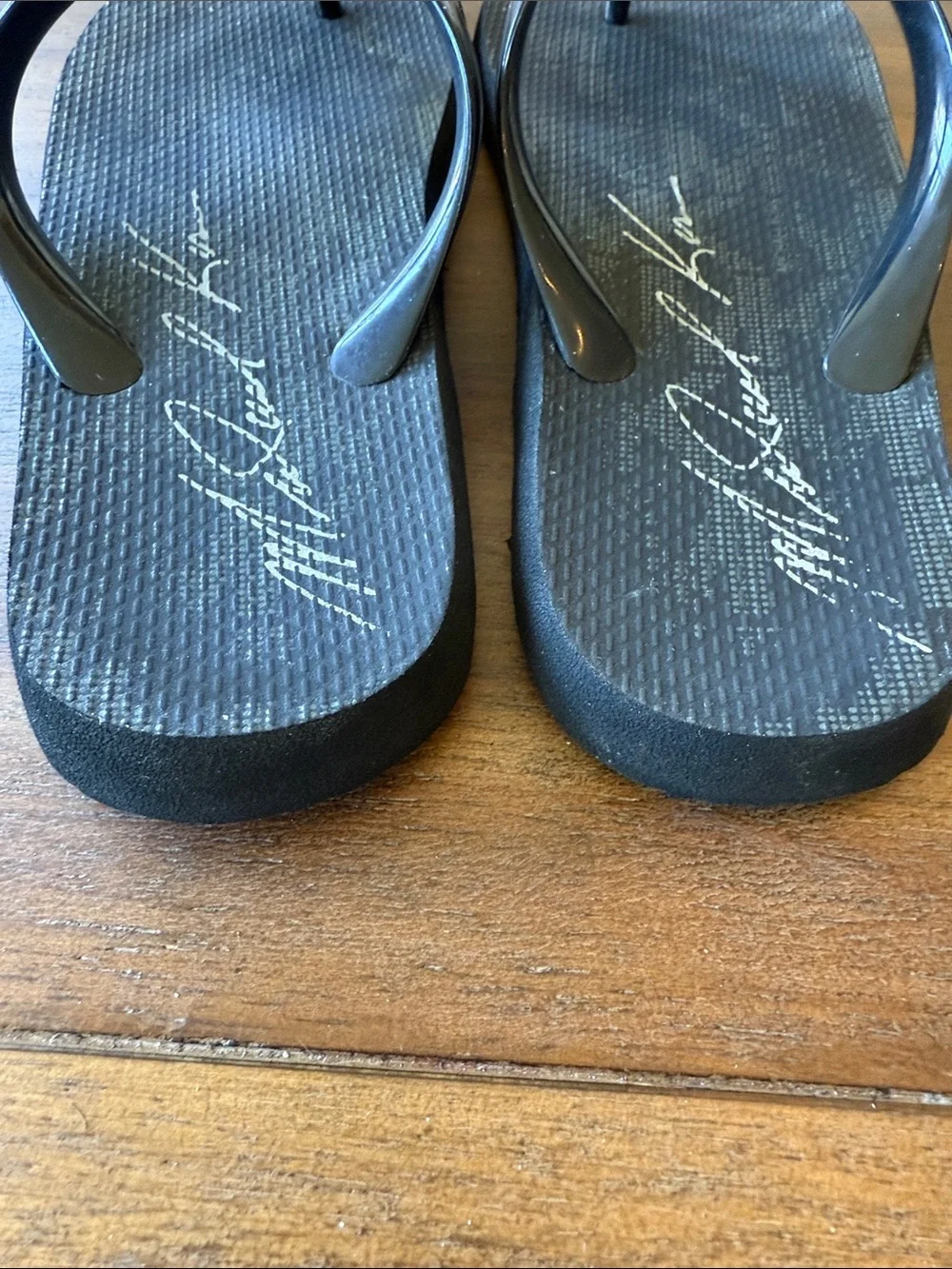 Michael Kors Black and Gold MK Logo Jelly Flip Flop Sandals